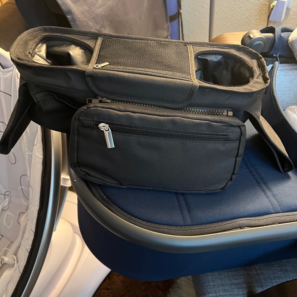 Bottle/ cup holder inc. zipper compartments for holding items on stroller